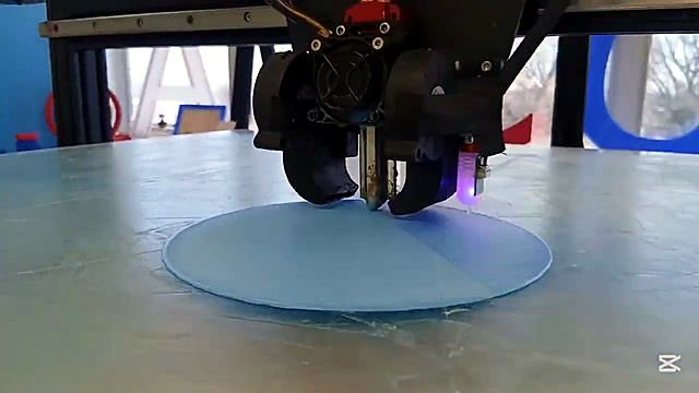 Extruder head + purple probe light mid-print (SKU ask)