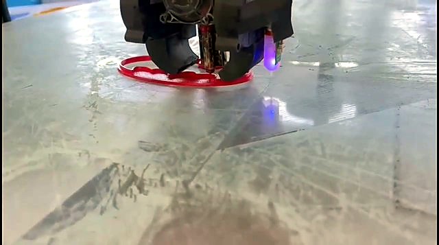Nozzle + purple level-sensor glow over red outline (SKU ask)