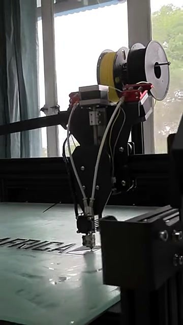Dual yellow/black spools + gantry over MACHINE.AFRICA bed (SKU ask)