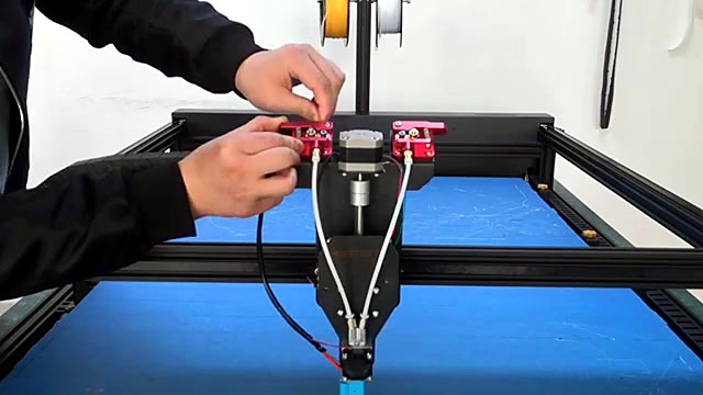 Dual red-tension filament feeders on carriage (SKU ask)