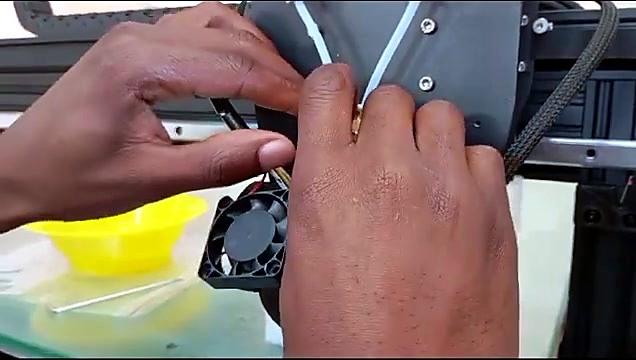 Red heat-sink detached from black carriage plate (SKU ask)
