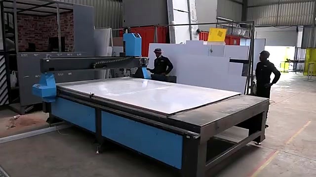 Large CNC router with white sheet in Sunnyrock workshop (SKU ask)
