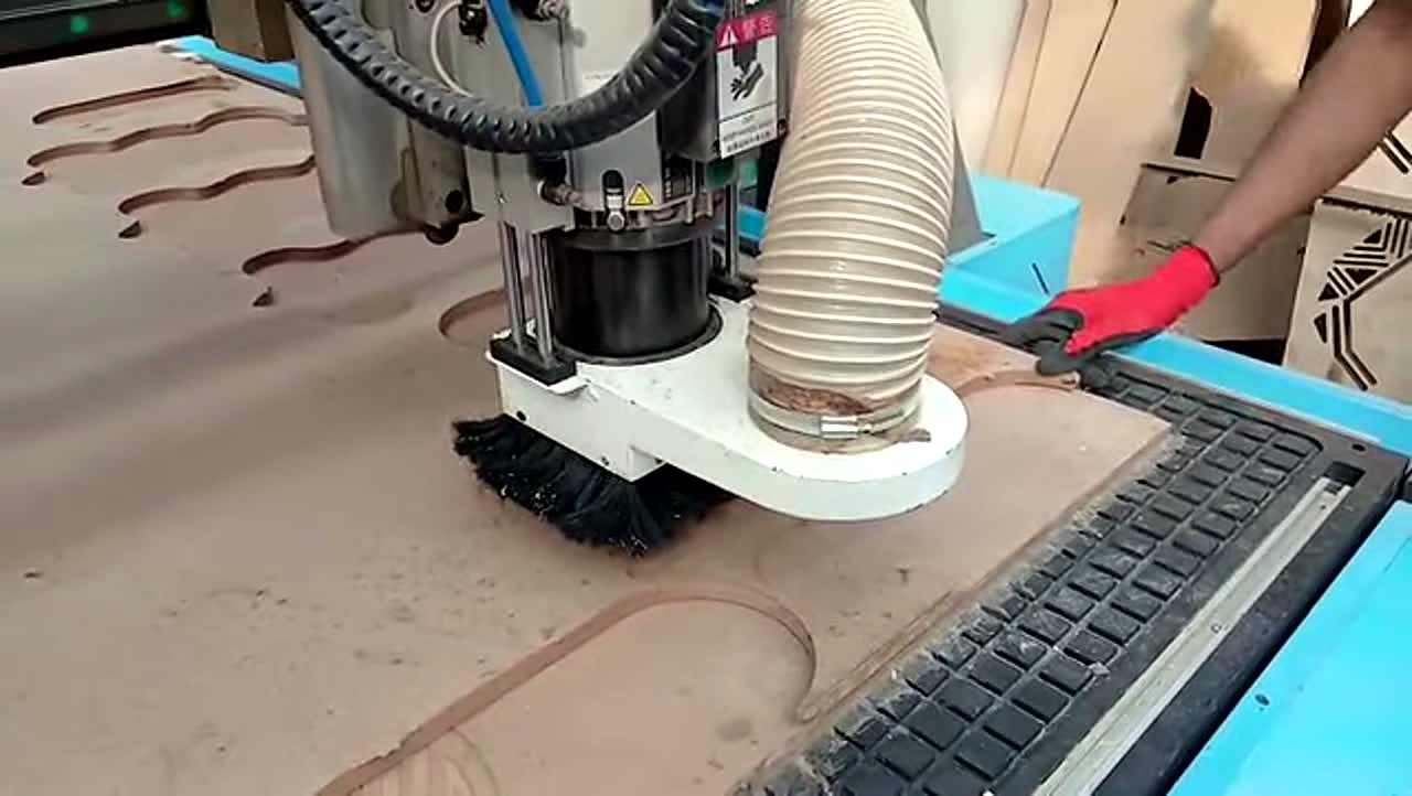R-2030K/90L ATC CNC cutting Supawood MDF 16mm (text/shape) on MDF spoilboard