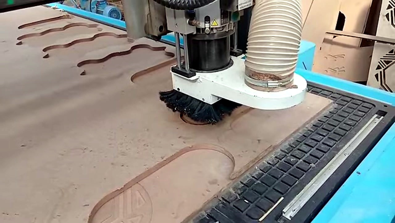 R-2030K/90L ATC CNC cutting Supawood MDF 16mm (text/shape) on MDF spoilboard