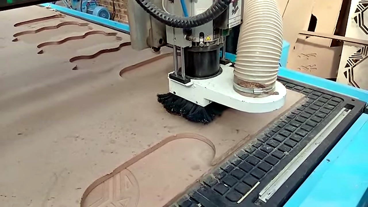 R-2030K/90L ATC CNC cutting Supawood MDF 16mm (text/shape) on MDF spoilboard