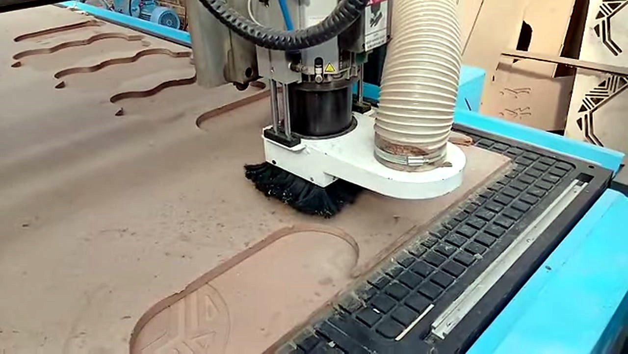 R-2030K/90L ATC CNC cutting Supawood MDF 16mm (text/shape) on MDF spoilboard