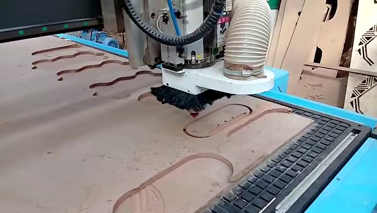 R-2030K/90L ATC CNC cutting Supawood MDF 16mm (text/shape) on MDF spoilboard