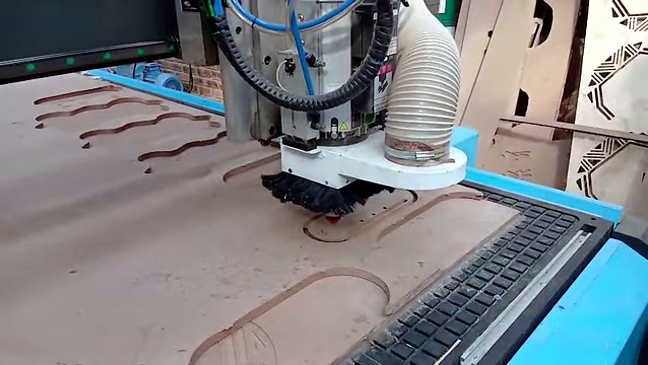 R-2030K/90L ATC CNC cutting Supawood MDF 16mm (text/shape) on MDF spoilboard
