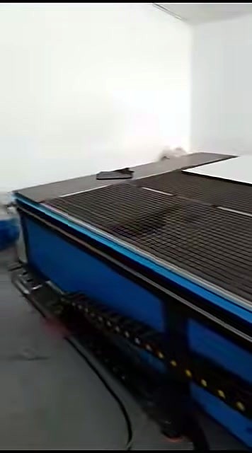 Wide CNC bed + side drag chain; white sheet on bed (SKU ask)