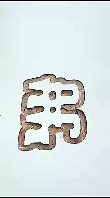 AM.CO.ZA logo-style cutout in white-faced sheet; brown core (SKU ask)