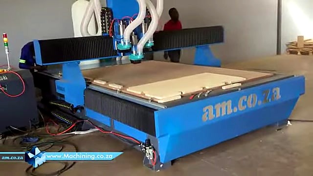Wide factory view; am.co.za on blue side panel (SKU ask)