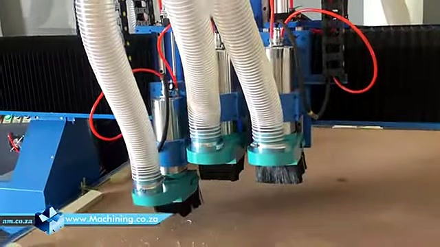 Close triple spindles + dust shoes over workpiece (SKU ask)