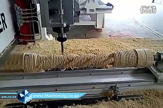 Spindle carving spiral softwood on rotary (SKU ask)