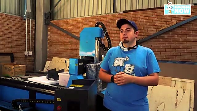 Blue CNC gantry with presenter (SKU ask)