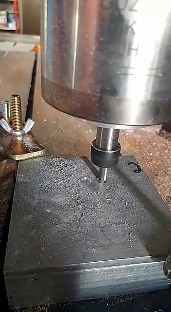 Bit in metal with accumulated swarf (SKU ask)