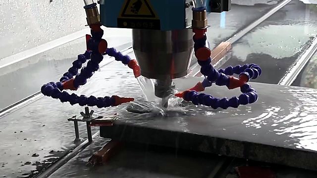 Multi-nozzle coolant streams on stone cut (SKU ask)