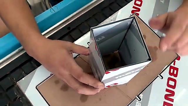 Folded hollow ACP box held in workshop (SKU ask)