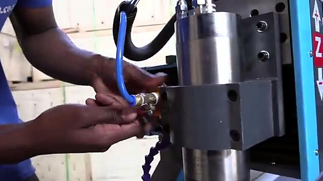 Spindle + coolant hose over T-slot bed (SKU ask)