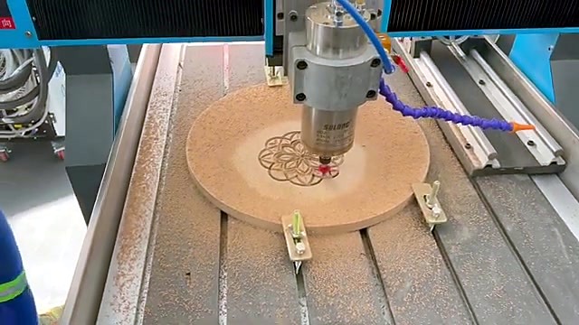 Circular MDF clamped on aluminium T-slot bed (SKU ask)