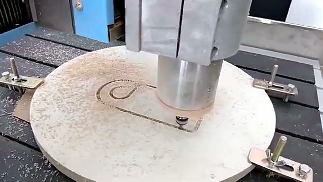 Plywood disc clamped on Express table pre-cut (SKU ask)