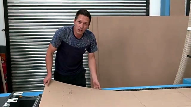 Presenter holding spoilboard edge at gantry (SKU ask)