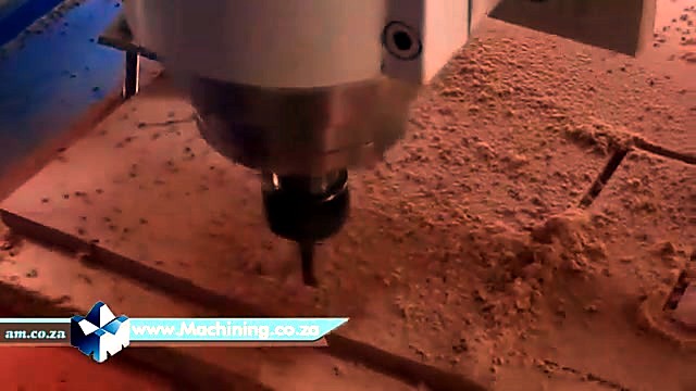 Spindle carving Supawood under heavy dust cloud (SKU ask)