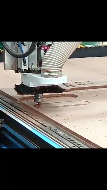 ATC spindle cutting with dust shoe