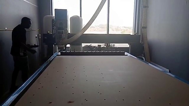 ATC rack + spindle/dust hose over blank sheet (SKU ask)