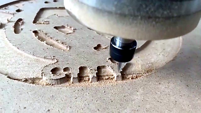 Early CITY letter carve + swarf on MDF (SKU ask)