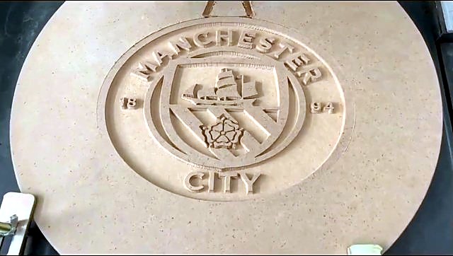 Finished Manchester City crest on circular MDF + clamp (SKU ask)