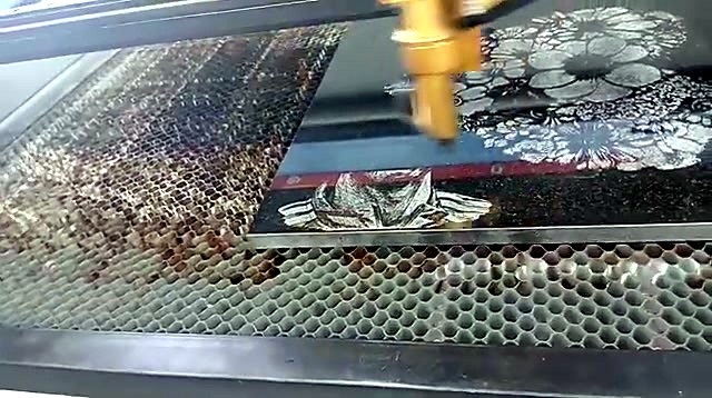 CO2 laser head engraving floral design