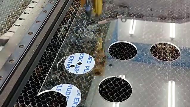 Cut-out acrylic discs with protective film