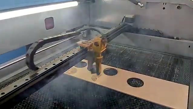 Laser engraving with smoke on wood