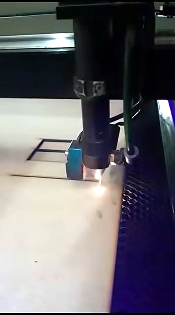 CO2 head + air-assist cutting board over honeycomb (SKU ask; title said plasma)