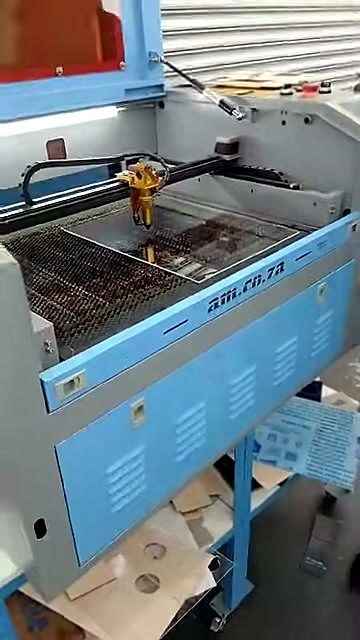 TruCUT-family CO2 cabinet open; am.co.za panel; acrylic on bed (SKU ask)