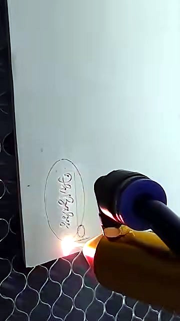 Cutting/engraving Oh Baby oval on white sheet over honeycomb (SKU ask)