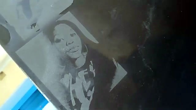 Finished dithered portrait on dark plate (SKU ask)