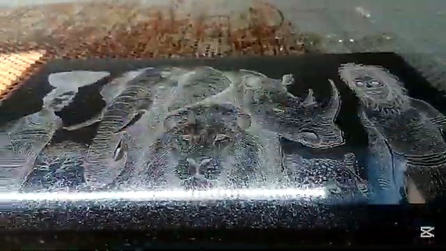 Granite engrave detail — elephant/figures (SKU ask)