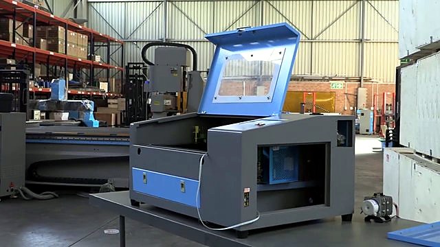 Open lid showing work area / gantry (SKU ask)