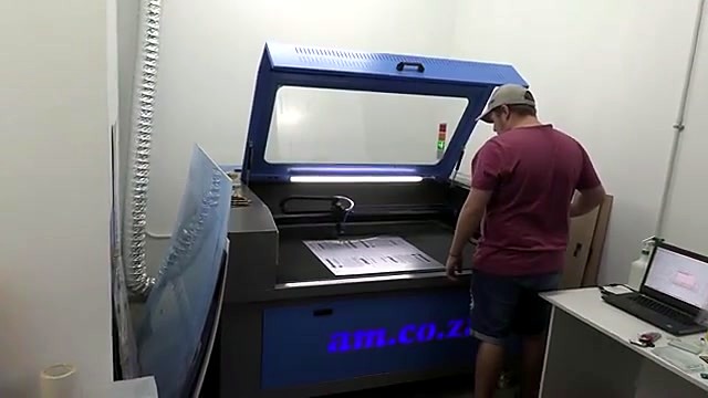 TruCUT cabinet open + am.co.za front + operator (SKU ask)