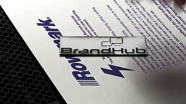 Operator mounting BrandHub plate on door (SKU ask)
