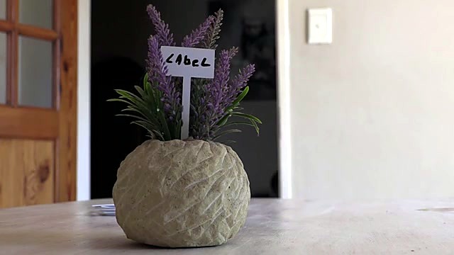 Finished LABEL stake in flower pot (SKU ask)