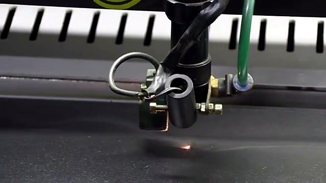 Laser head cutting dark sheet (SKU ask)