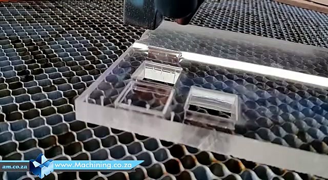 Laser head over thick clear Perspex sheet (SKU ask)