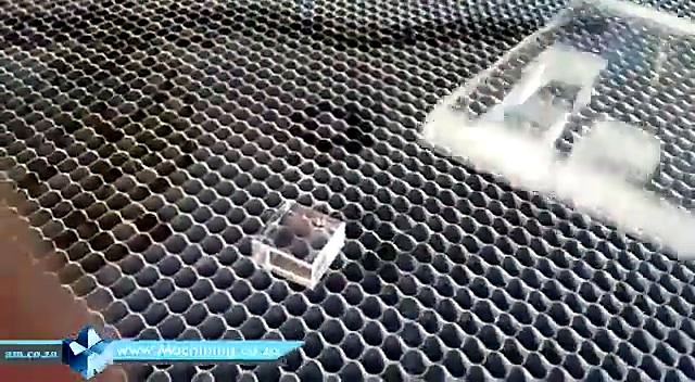 Finished clear acrylic square cutout on honeycomb (SKU ask)