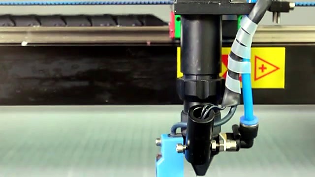 Laser head + blue cooling hoses on X rail (SKU ask)