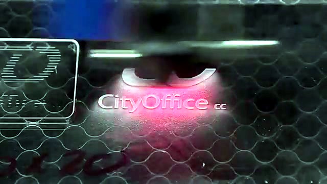 CO2 pink glow engraving CityOffice.cc on clear Perspex (SKU ask)