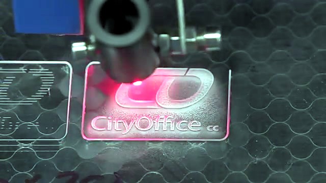 Sandblast-effect logo engrave in progress on acrylic (SKU ask)