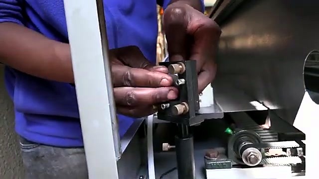 Mirror mount screw alignment close-up (SKU ask)