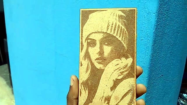 Finished portrait plaque held up (SKU ask)